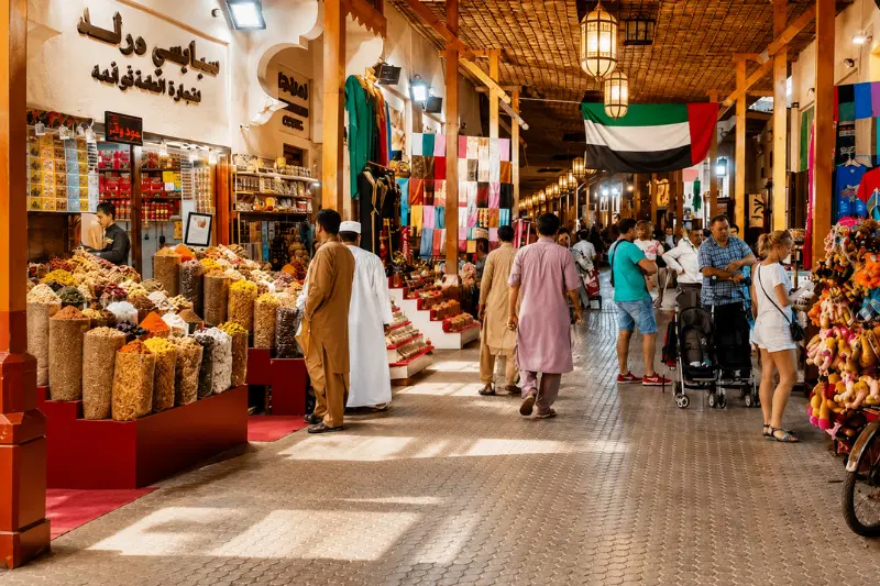 Traditional Dubai spice market with colorful stalls