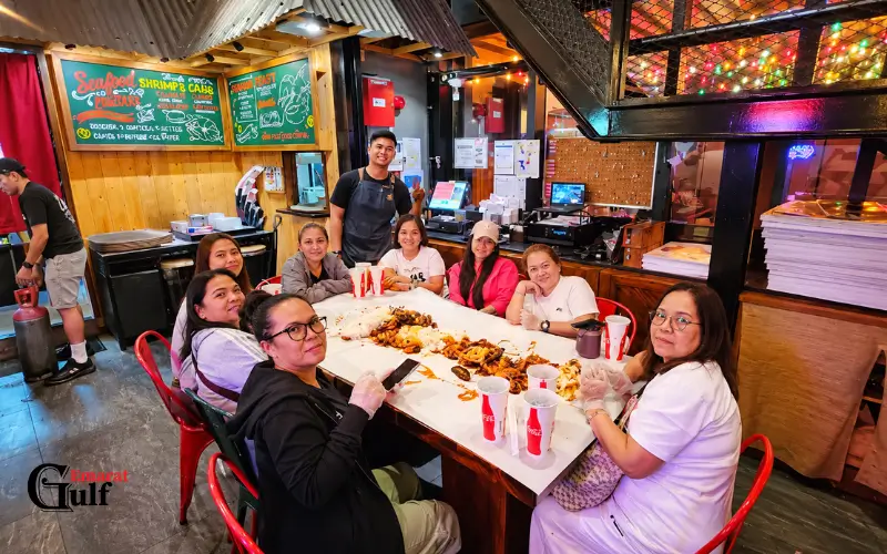 Dampa Seafood Grill Dubai dining with friends.